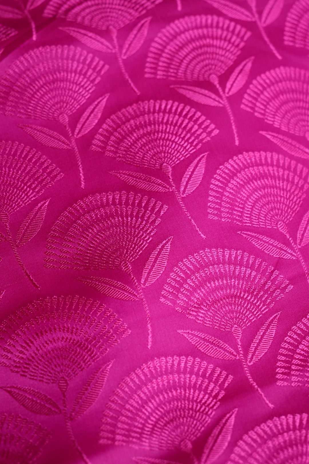 Semi Satin Silk Fabric in Rani Pink with Floral Booti