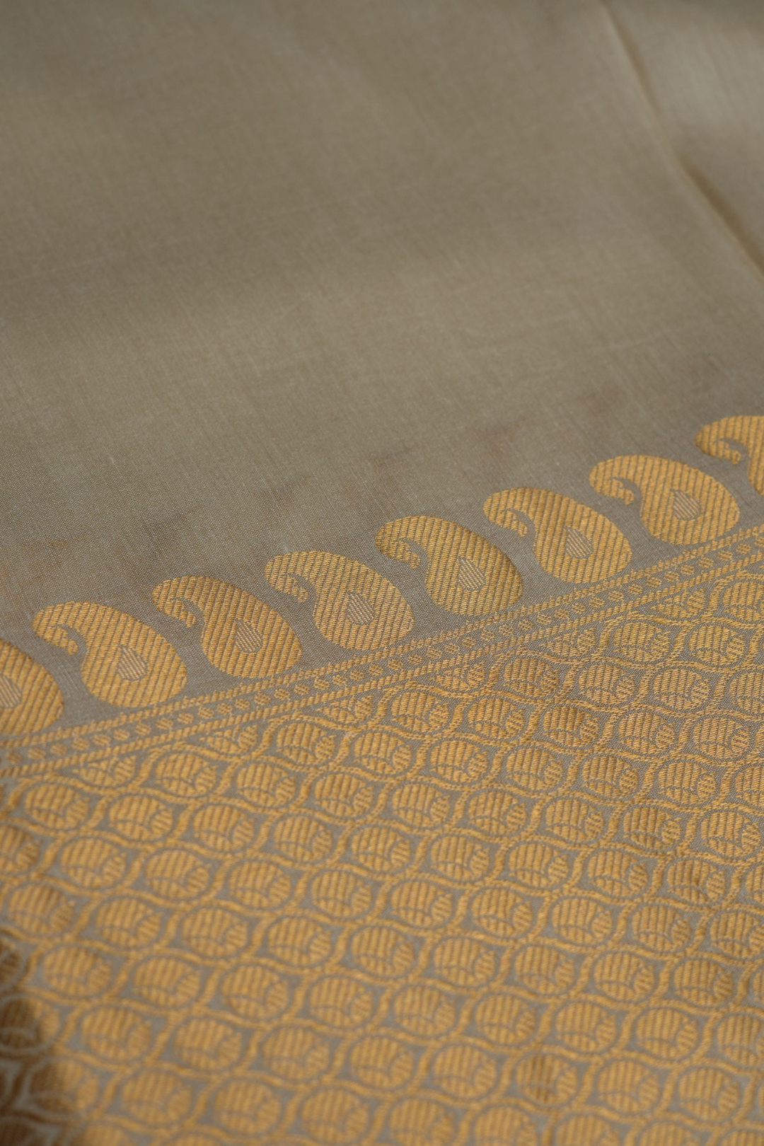 Handwoven Munga Silk Fabric with Gold Zari Paisley Border