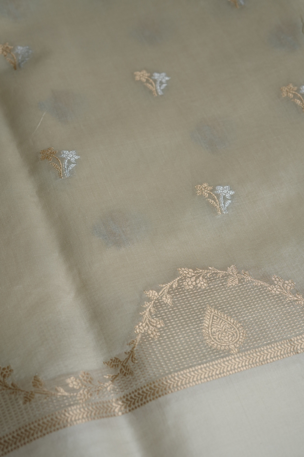 Handwoven Cream Cotton Fabric with Gold and Silver Zari Bel and Floral Motifs