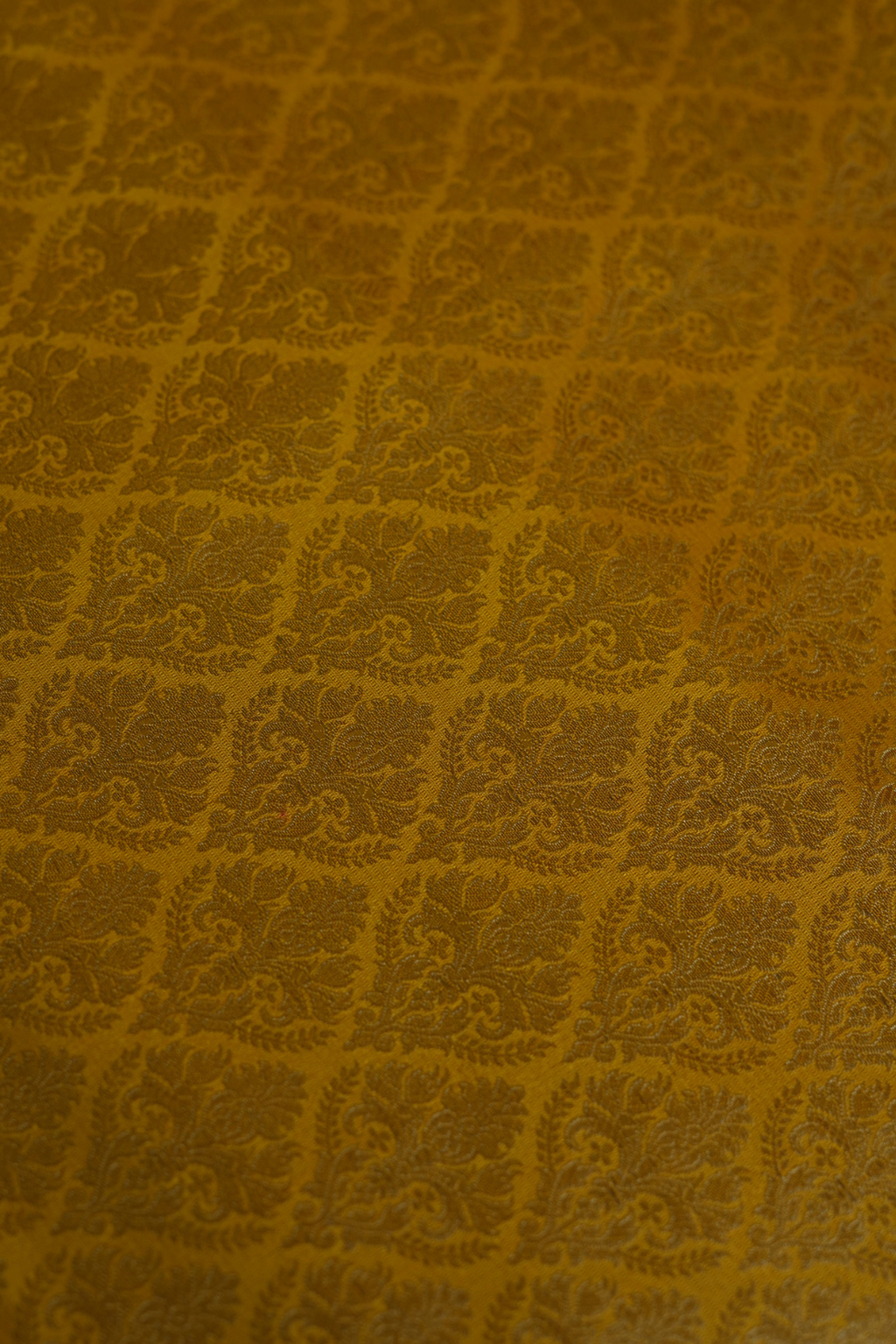 Semi Silk Brocade Fabric in Yellow with Floral Motifs