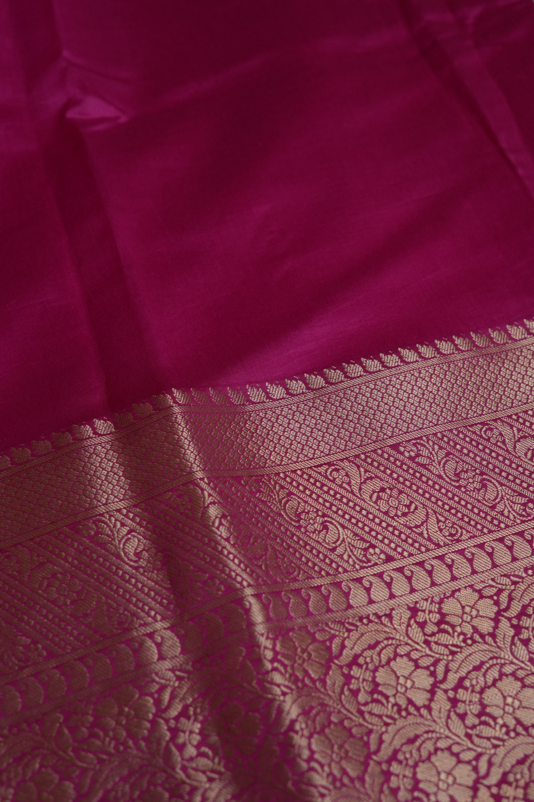 Handwoven Munga Silk Fabric with Gold Floral and Geometric Border