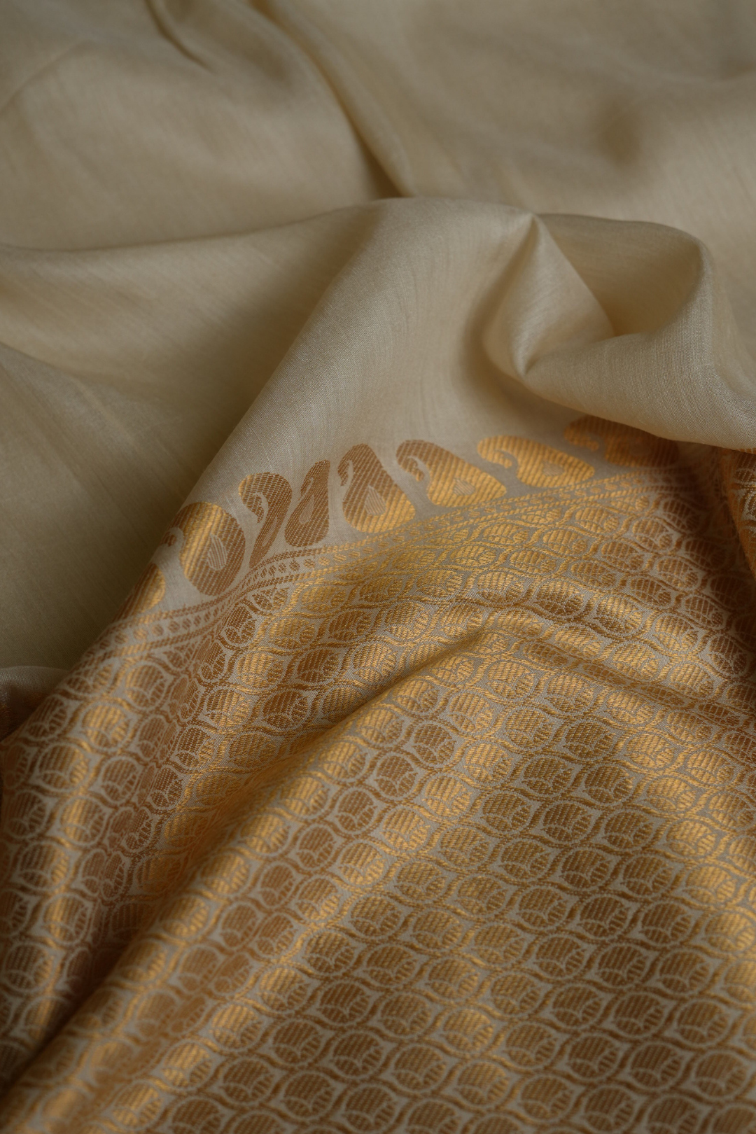 Handwoven Munga Silk Fabric with Gold Zari Paisley Border