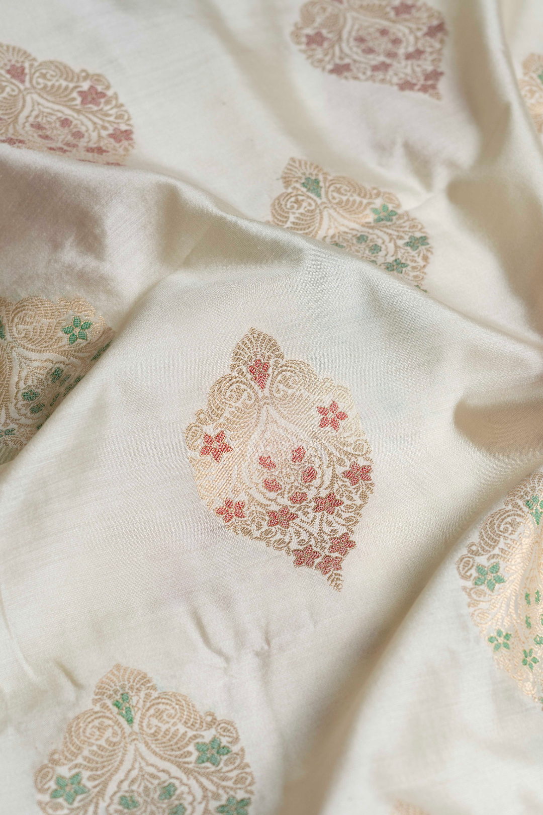 Handwoven Ivory Cotton Fabric with Multicolour Buti