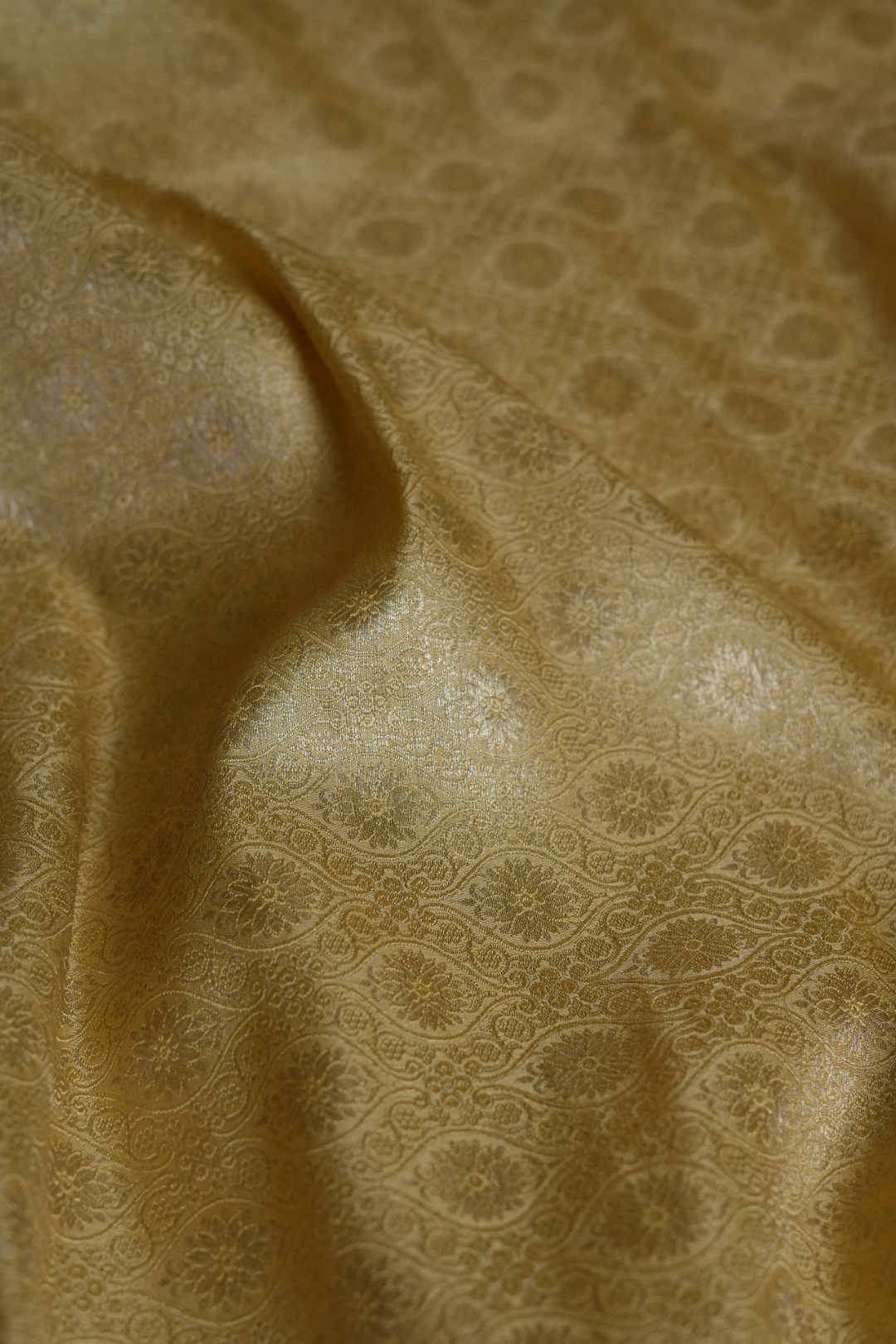Semi Silk Brocade Fabric in Golden with Floral and Paisley Motifs