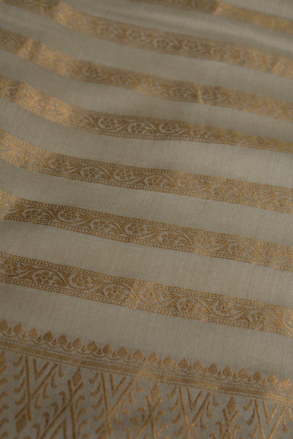 Handwoven Ivory Munga Silk Fabric with Gold Zari Stripes and Border