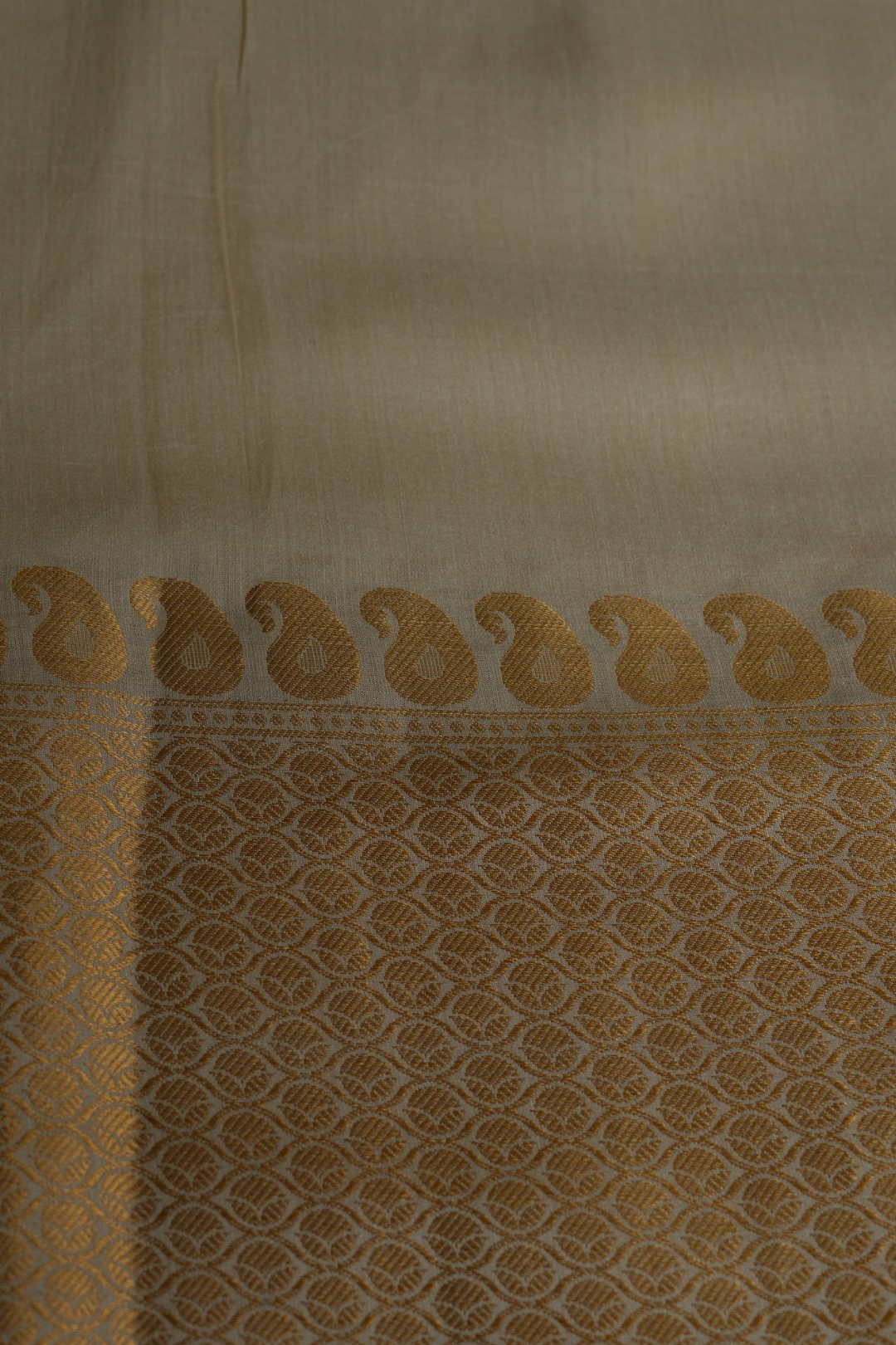 Handwoven Munga Silk Fabric with Gold Zari Paisley Border