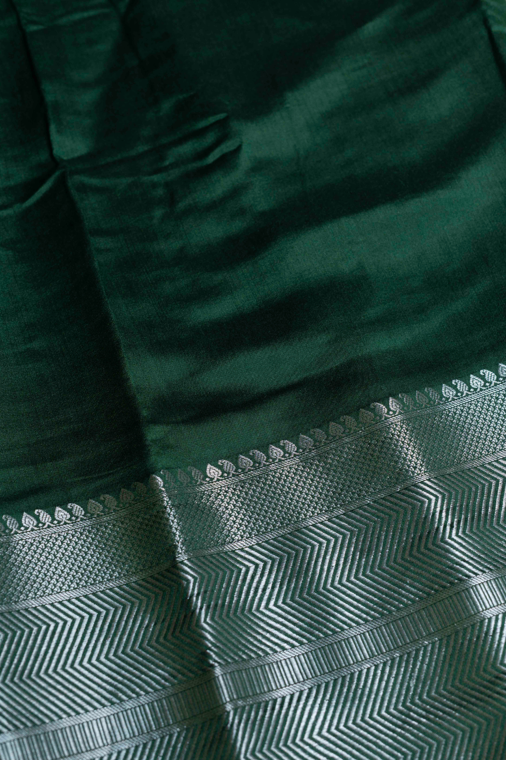 Handwoven Green Munga Silk Fabric with Silver Border