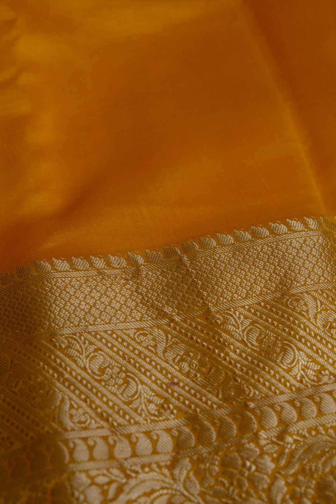 Handwoven Munga Silk Fabric with Gold Floral and Geometric Border