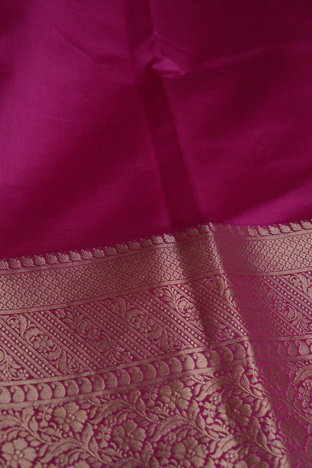 Handwoven Munga Silk Fabric with Gold Floral and Geometric Border